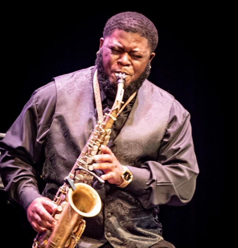 Kenneth Goolsby playing saxophone on stage